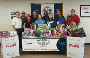 Boeing employees in North Charleston, SC, who are in the midst of an organizing drive with the IAM, joined forces with local members of the Longshoremen’s Union to collect gifts for the Toys for Tots program.