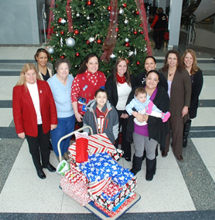 IAM Headquarters staff donated presents and Christmas dinners to two Washington, DC-area families this holiday season.